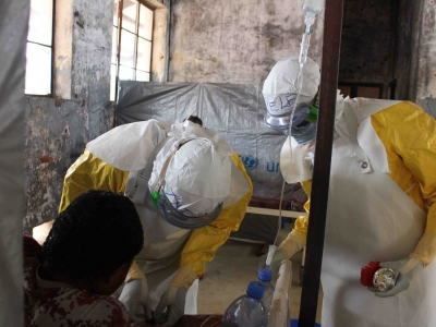 Medical staff providing treatment in MSF-supported Bolomba Ebola treatment center, Equateur province, DRC, August 2020