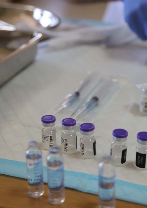 Doses of COVID-19 vaccines are being prepared before the vaccination of elderly people and of their caretakers at a nursing home in Shayle (Mount Lebanon).