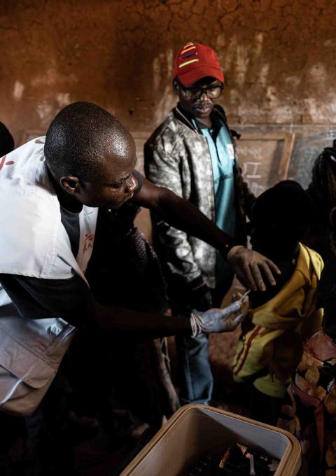 MSF medical staff administers measles vaccinations to children in Ndjala village, Drodro Ituri province, Democratic Republic of Congo, May 2023