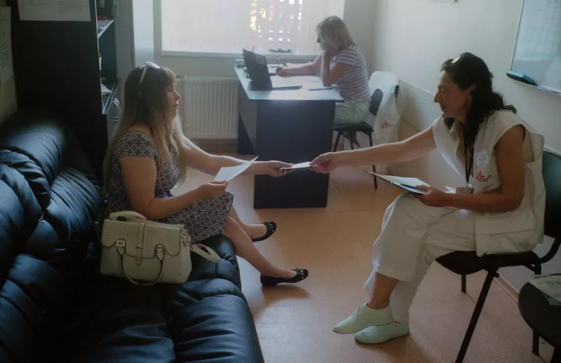 Olena Melnikova, is having a session with Louiza Solodka, MSF peer educator in an MSF Patient Support, Education, Counselling (PSEC) room. Olena is one of the patients who underwent the hepatitis C treatment provided by MSF in Mykolaiv, Ukraine, 2018.