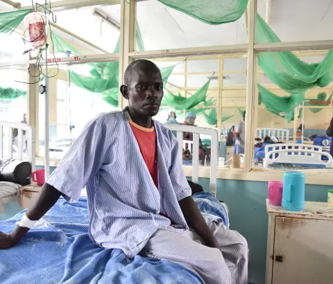 David was admitted at the HBCTRH after he falling sick. He had cryptococcal meningitis and Karposi Sarcoma – a kind of cancer common among HIV-positive patients who are failing treatment. The KS had affected his left leg as well and he has to walk using supports.